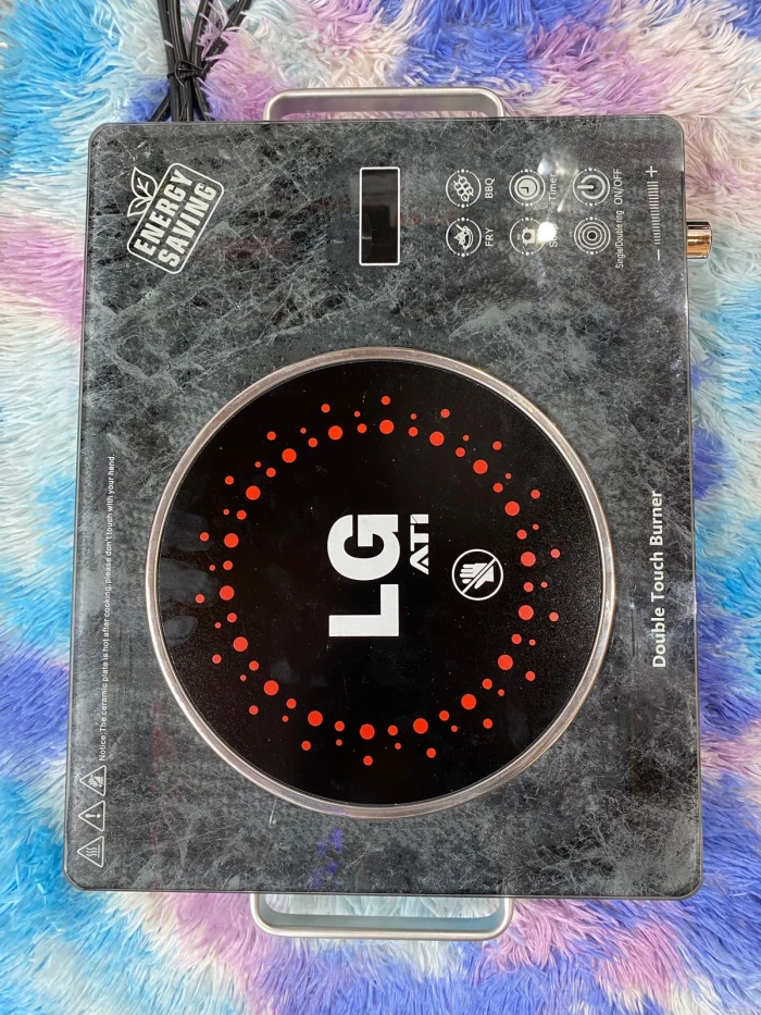LG  portable infrared glass-ceramic electric cooktop featuring a black marble-pattern surface and an